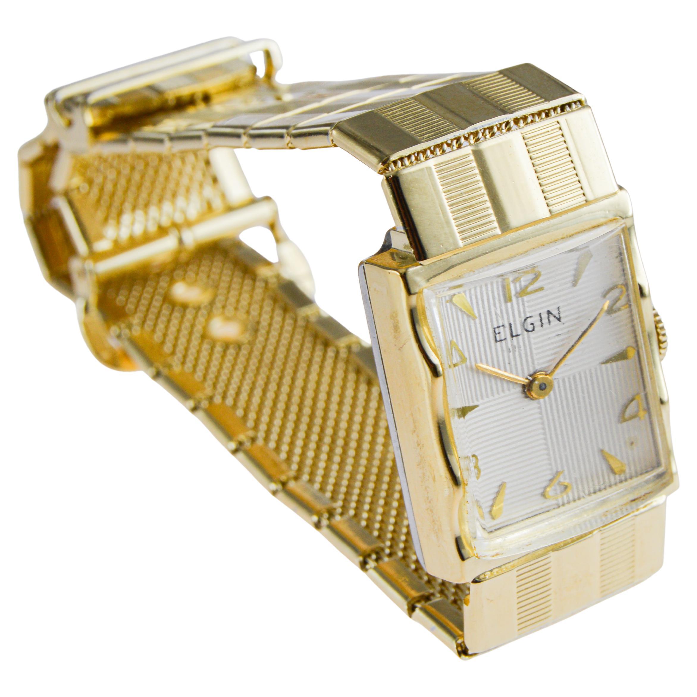 Reloj Art Déco Elgin de oro amarillo de los años 50 con esfera original en venta 4