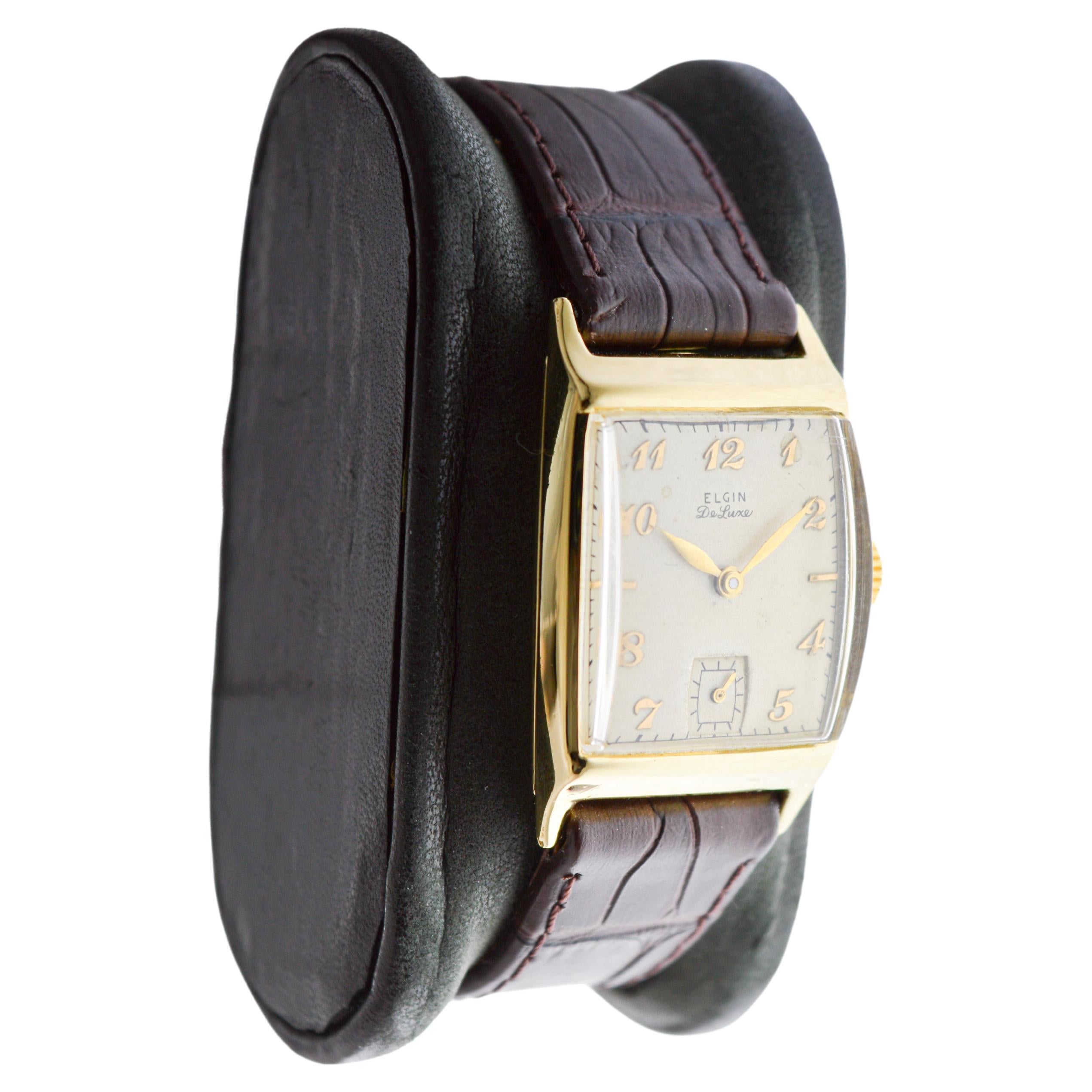 FACTORY / HOUSE: Elgin Watch Company
STYLE / REFERENCE: Art Deco / Tonneau Shaped
METAL / MATERIAL: Yellow Gold Filled
CIRCA / YEAR: 1940's
DIMENSIONS / SIZE: Length 35mm X Width 22mm
MOVEMENT / CALIBER: Manual Winding / 17 Jewels / Caliber 558
DIAL