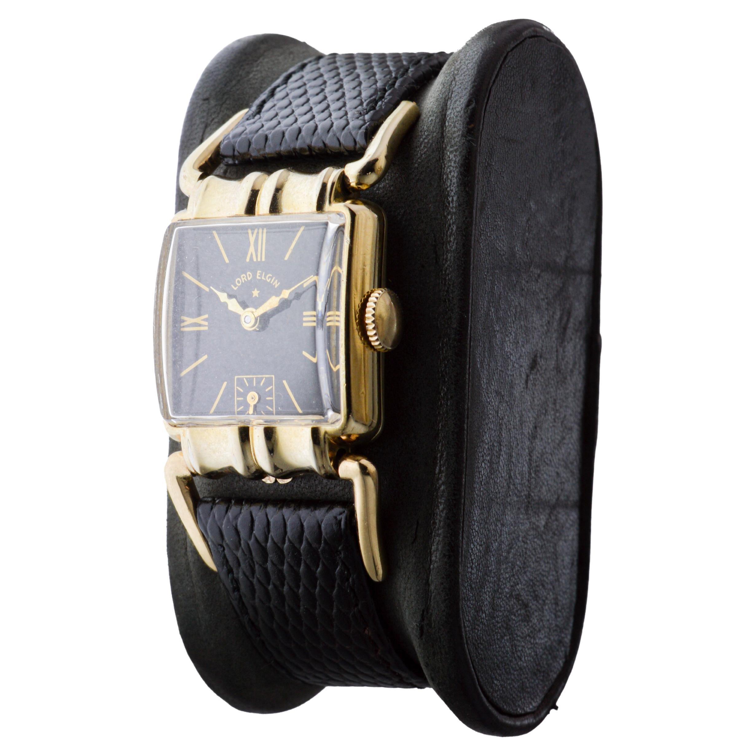 Reloj Art Déco Elgin relleno de oro amarillo con rara esfera negra  Ganchos articulados en venta 1