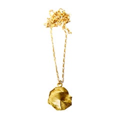 18 Karat Gold Ocean Shield Necklace