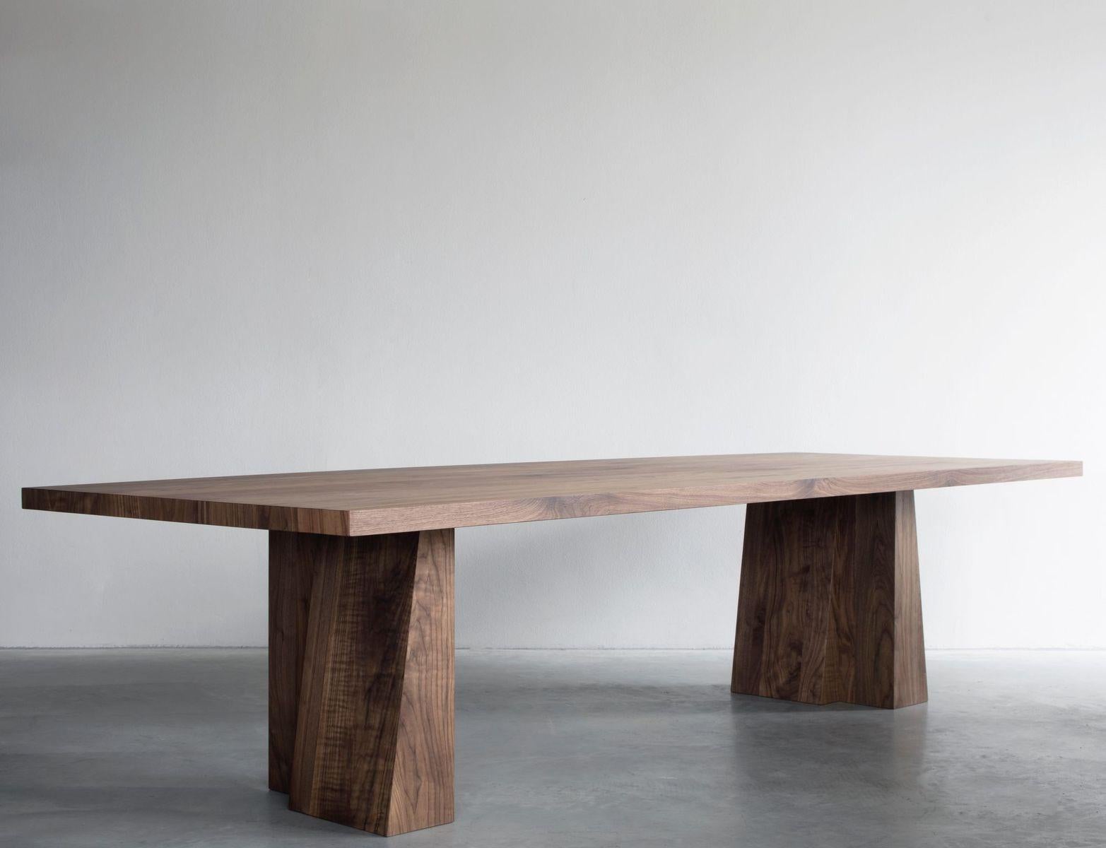 Eli dining table by Van Rossum
Dimensions: D260 x W110 x H74 cm
Materials: Walnut.

The wood is available in all standard Van Rossum colors, or in a matching finish to customer’s own sample.

Van Rossum oak or walnut table with two pairs of