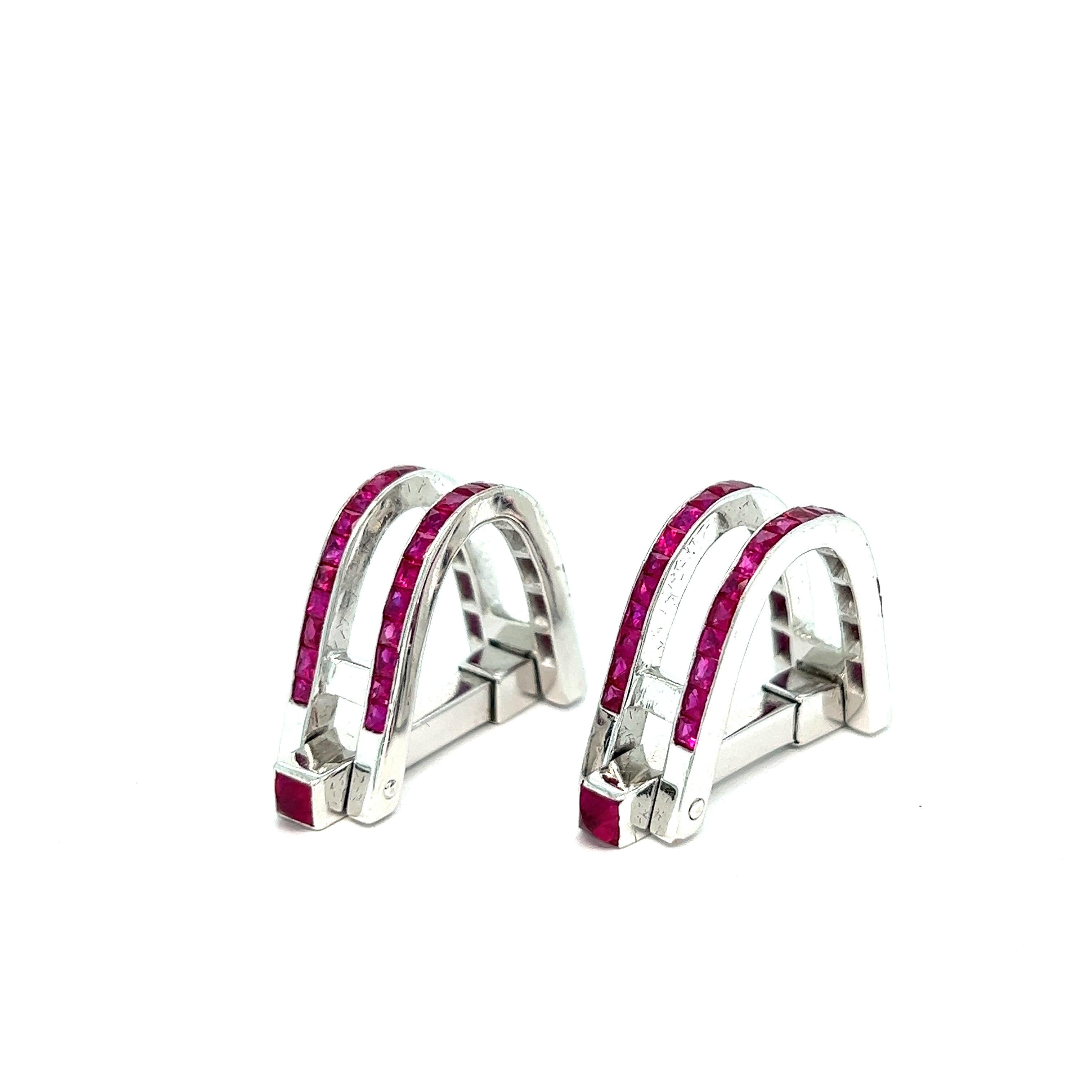 Eli Frei ruby white gold cufflinks

French-cut rubies set on 18 karat white gold

Size: width 8 mm, length 30 mm
Total weight: 16.4 grams