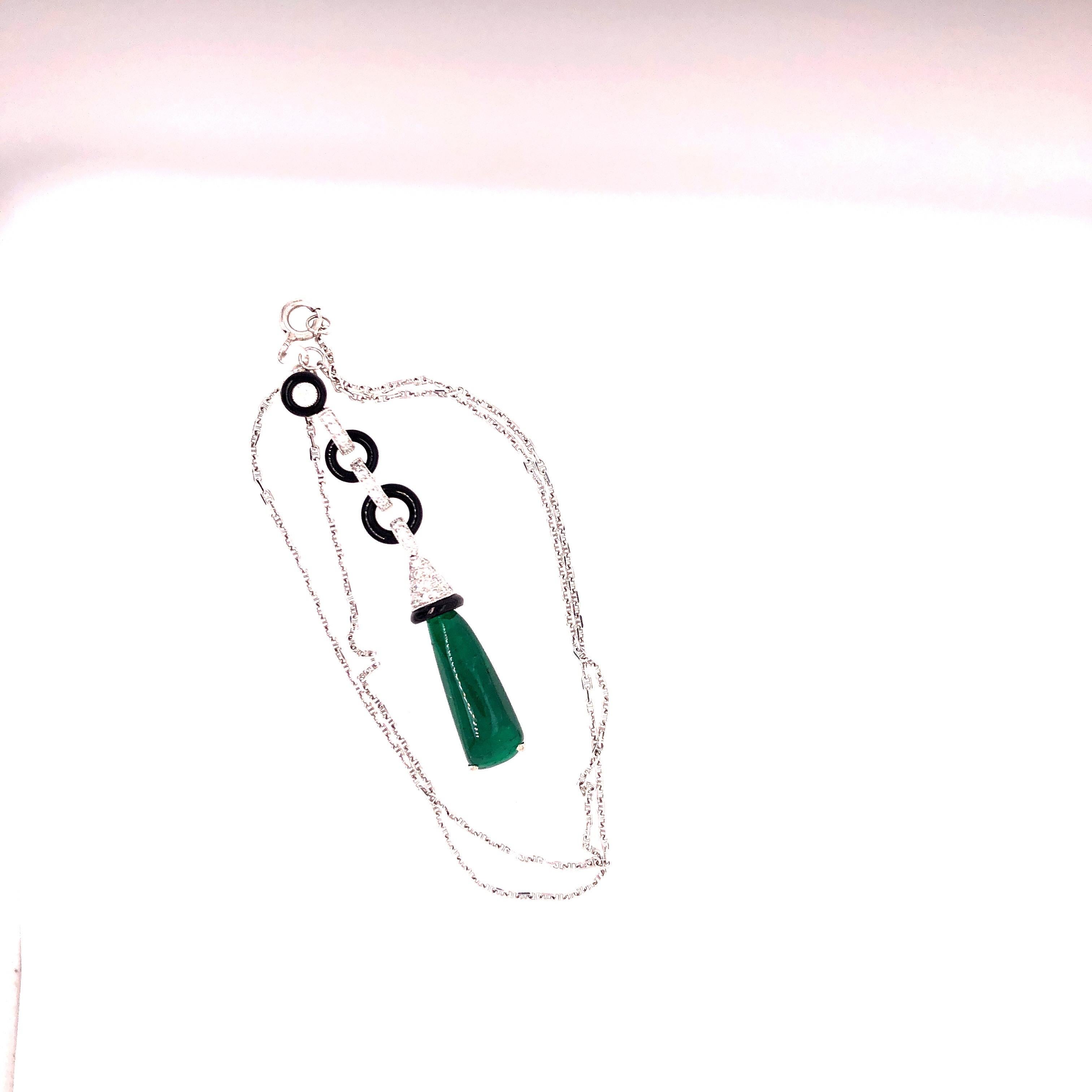Fabulous Classic White Gold Cabochon Emerald and Onyx Pendant on white gold chain which is stamped 750 and Italy.  Pendant Stamped FREI and 750.  