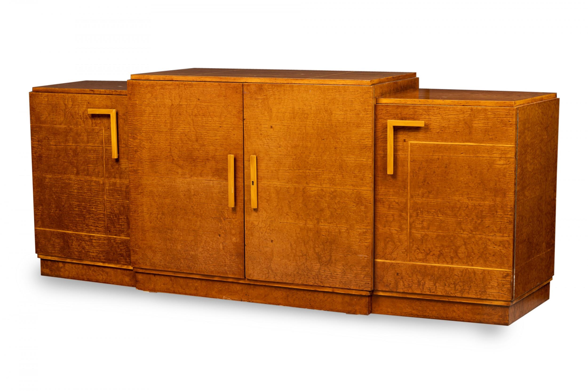 Art Deco (1930s) American birds-eye inlaid maple credenza composed of 3 cabinet components with a burled veneer, decorated with inlaid banding, 4 doors (with geometric rectangular pulls) opening to reveal 2 columns of pullout drawers from the side