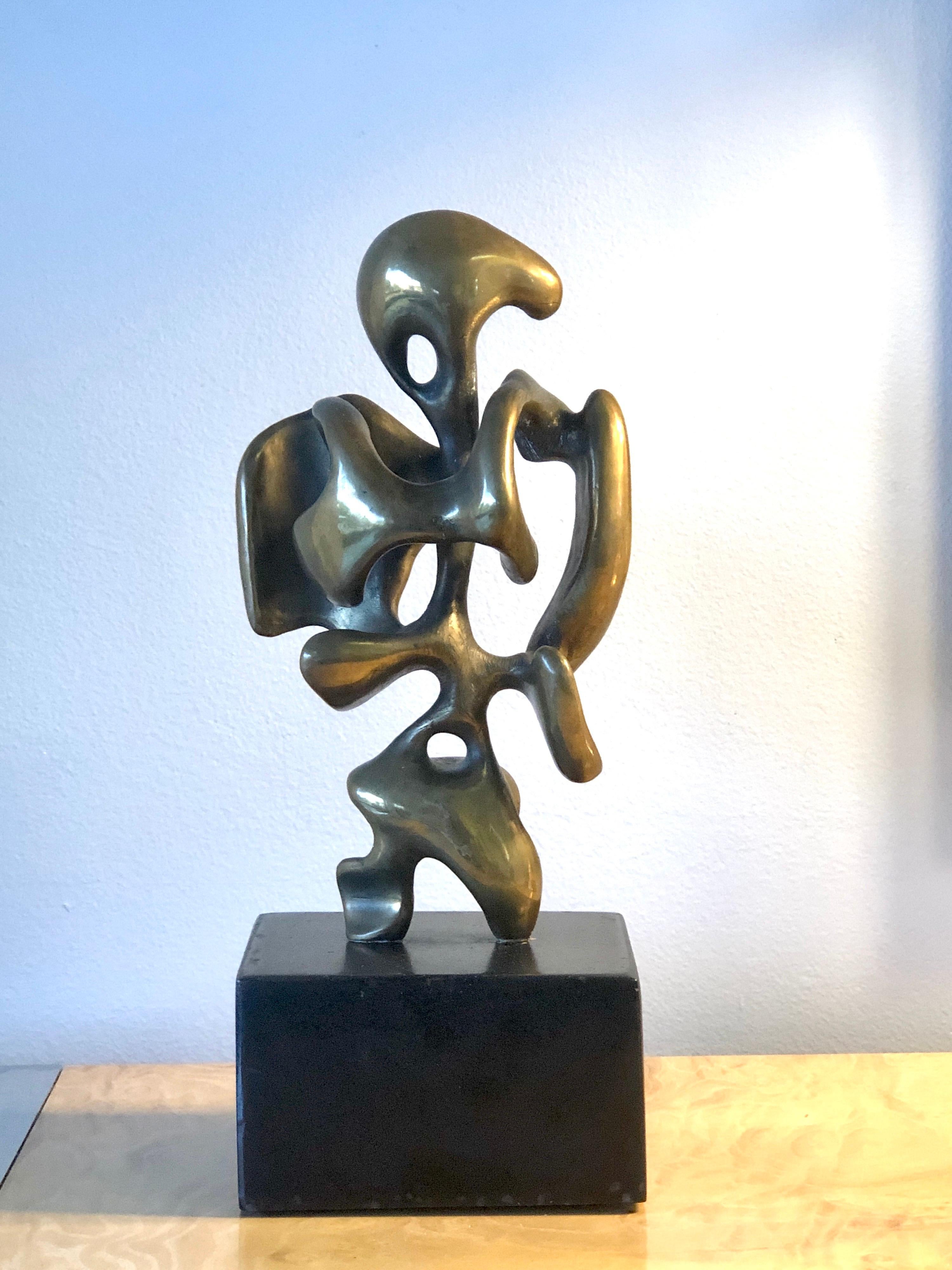 A wonderful bronze by Eli Karpel. Mounted on its original revolving base as envisioned by the artist. Signed and numbered 9 of an edition of 20.