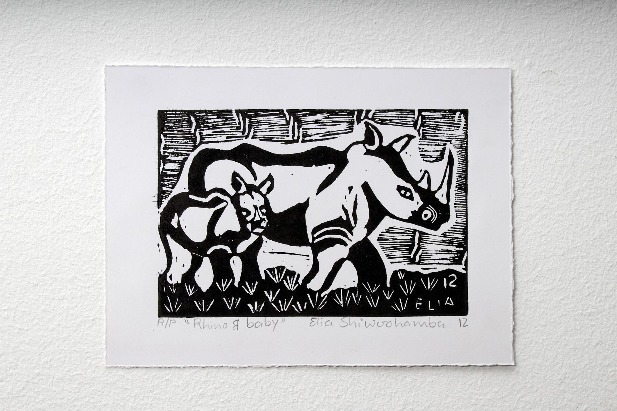 Rhino and baby, Elia Shiwoohamba, Linoleum block print