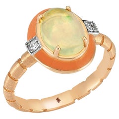 Helios-Ring aus Roségold mit Opal und weißem Diamant