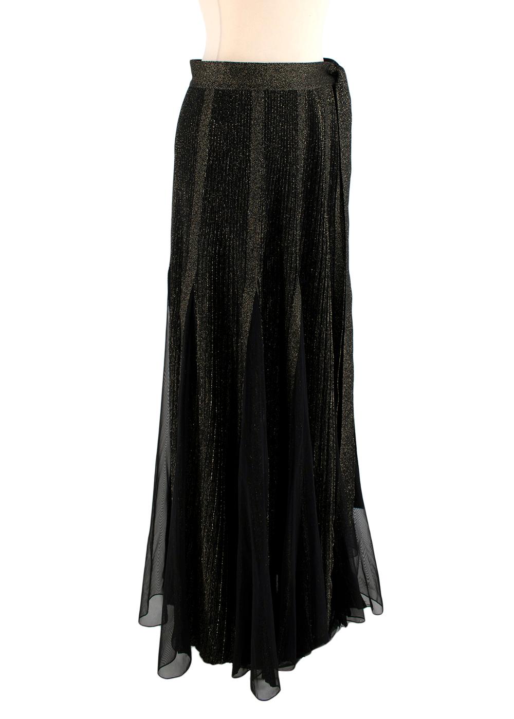 Elie Saab Black & Gold Sparkle Panelled Mesh Maxi Skirt

- Dense fine knit, with gold-tone sparkle throughout
- Faux-pleated effect with added sheer tulle mesh panels creating movement
- Press-stud closure to the side finished with a self-tie ribbon