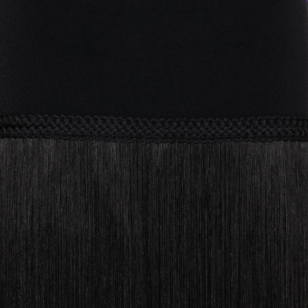 Wear this stylish and contemporary Elie Saab skirt which is just what you need to be at the top of your style game. Crafted from knit fabric, this luxurious creation comes in a classic shade of black. The skirt is styled with tassels throughout that