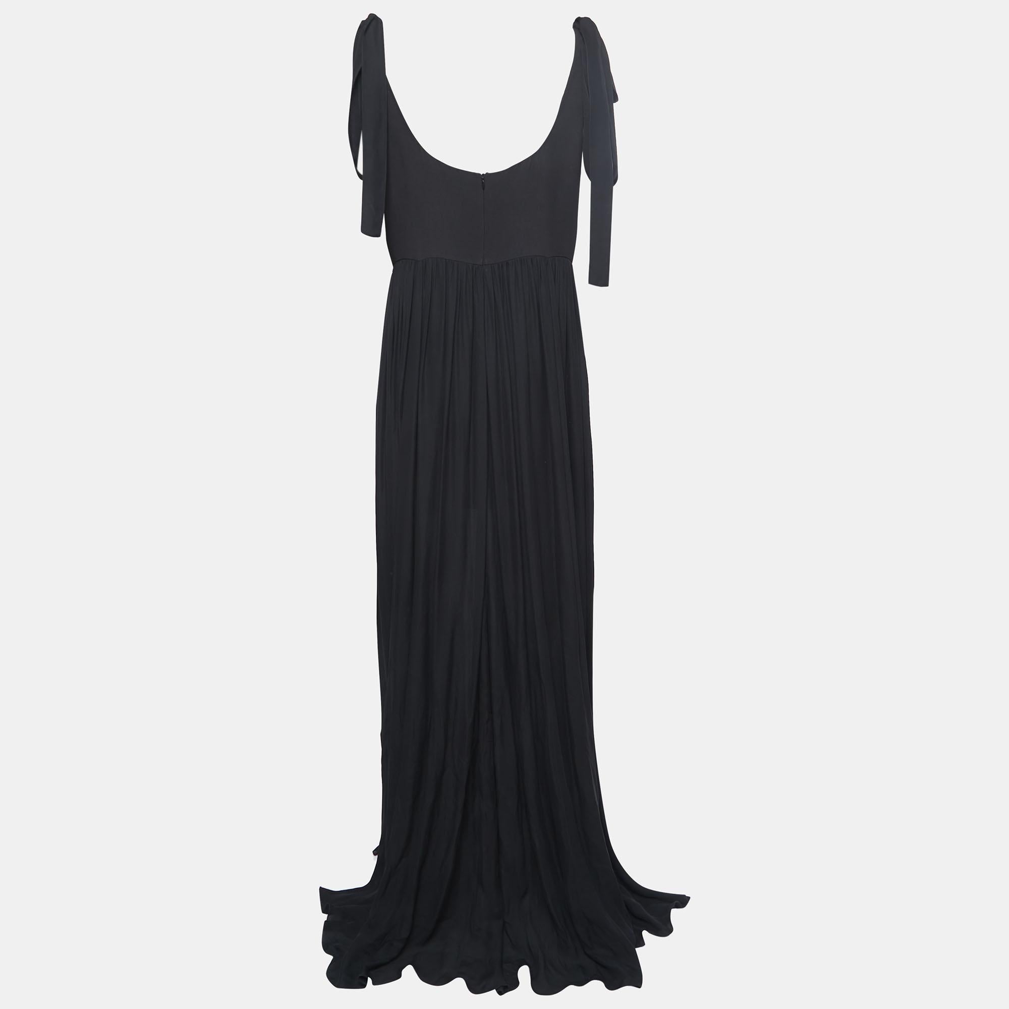 This Elie Saab maxi dress is an absolutely dreamy piece. Featuring an embellished front and a sweeping hemline, this dress is sure to spark joy!

Includes: Tag, Extra embellishments