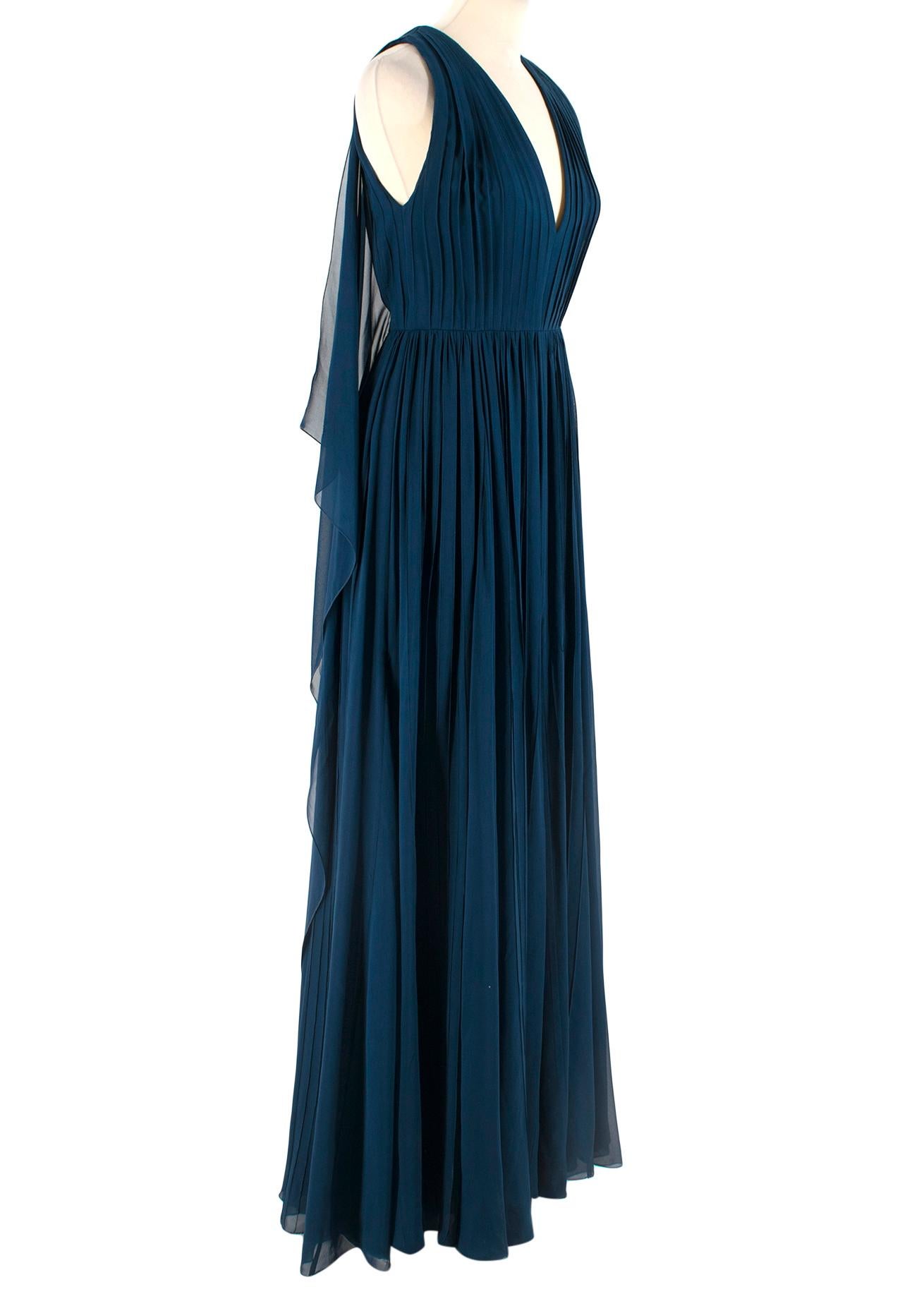 Elie Saab Blue Pleated silk-chiffon gown

- Flowy panels on back
- Zipper and hook in good condition
- Thin belt at waist
- Sewn line detail
- Sleeveless; v-neck

Please note, these items are pre-owned and may show signs of being stored even when