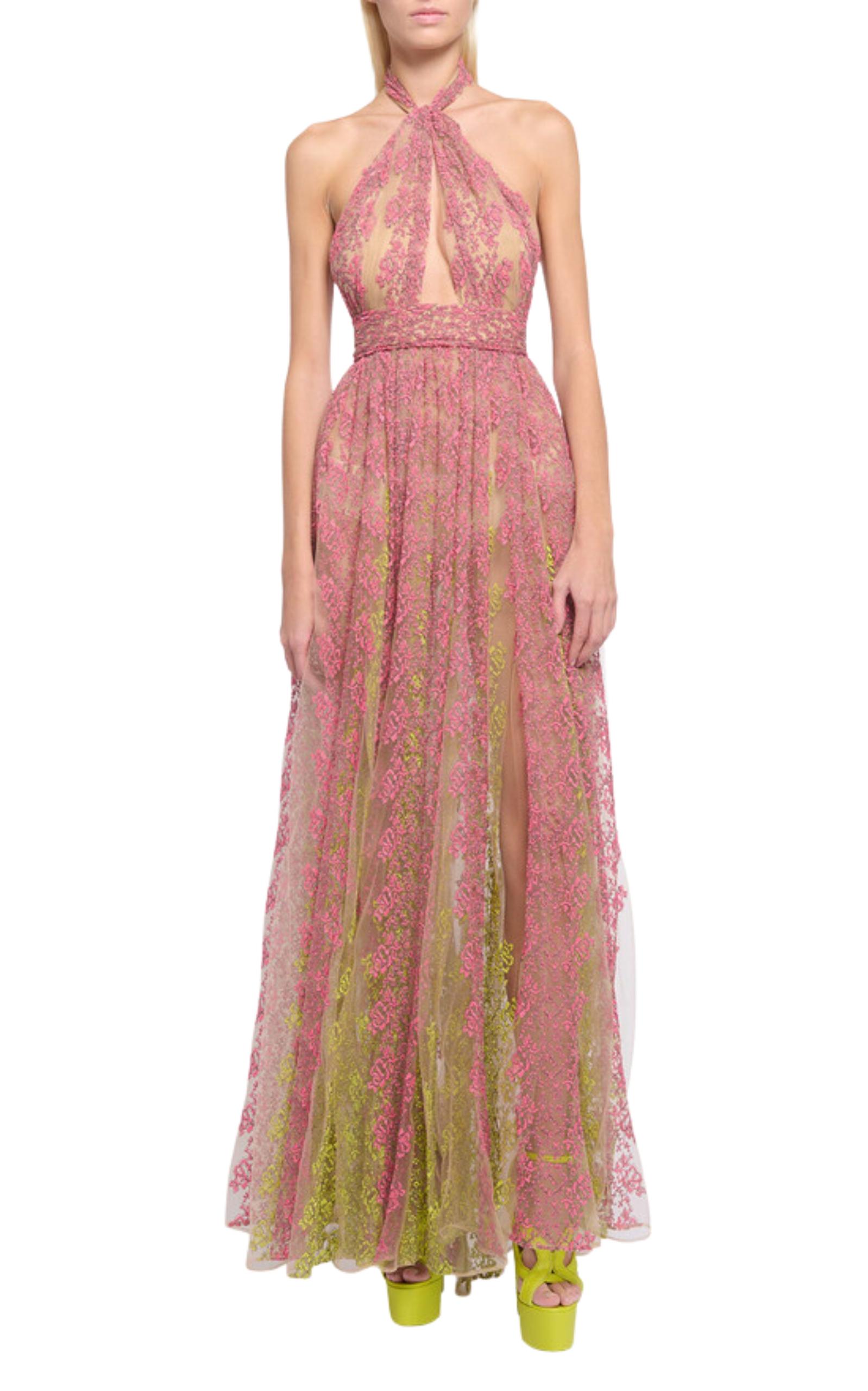 Elie Saab Floral Embroidery Tulle Floral Gown with pleats featuring halter neckline and a keyhole front.
Open-back 
Sleeveless 
Banded waist 
A-line silhouette 
Full length 
Back zip 
Polyester/polyamide 
Lining: Silk 100%
Dry clean 
Made in Lebanon