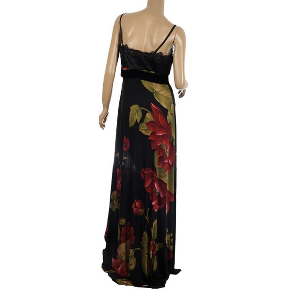 Turn all eyes on you with this fabulous Elie Saab Floral Print Black Gown. This sleeveless long dress comes with a Roman style lace detailed bust and a flowing floral patterned skirt.

Includes: The Luxury Closet Packaging

