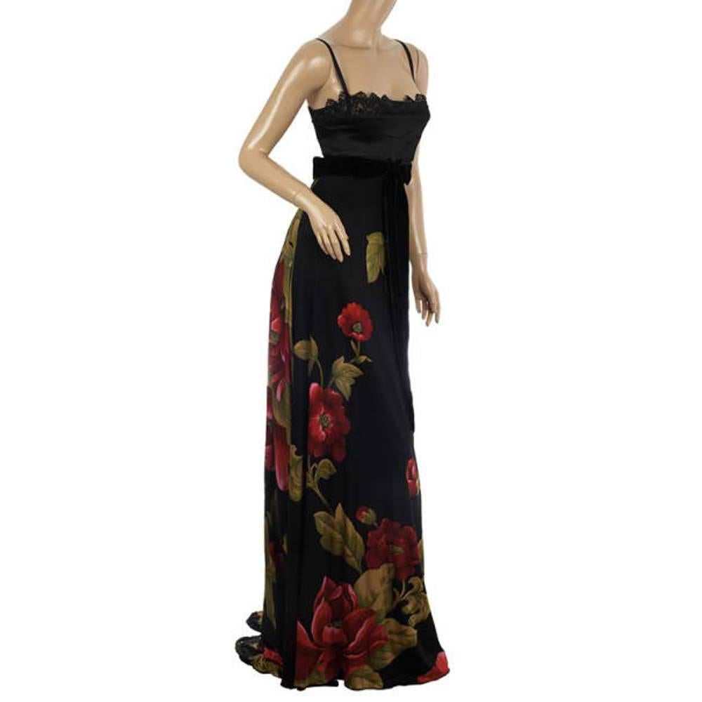Turn all eyes on you with this fabulous Elie Saab Floral Print Black Gown. This sleeveless long dress comes with a Roman style lace detailed bust and a flowing floral patterned skirt.

Includes: The Luxury Closet Packaging

