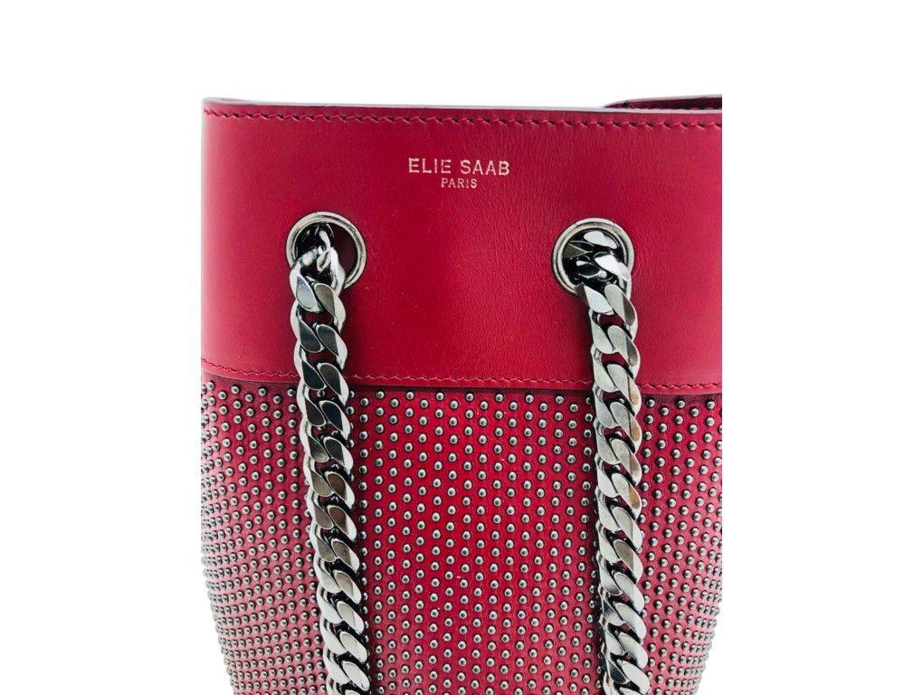 This Elie Saab red studded bucket bag is just exquisite. The ruthenium hardware next to the red leather is just stunning as well as the studded detail. A preloved bag which is in excellent condition.

BRAND	
Elie Saab

ACCESSORIES	
Dust bag,