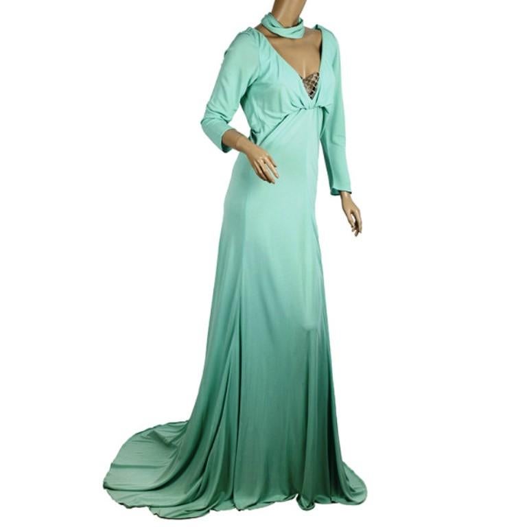 You will be the belle of the ball in this exquisite Elie Saab Ruched Waist Baby Blue Gown. This long flowing gorgeous dress is accented with a v-neck with crystal embellishments, long sleeves and a train.

Includes: The Luxury Closet Packaging

