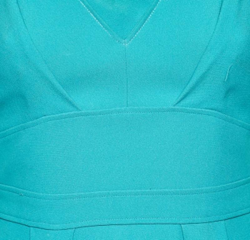 This dress midi dress personifies grace and femininity in every way. A creation from the House of Elie Saab, this midi dress is tailored skillfully using teal-blue crepe material with pleated details. Pair this piece with stilettoes and matching