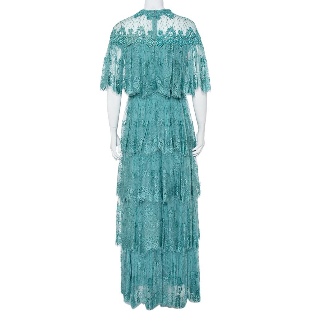 Elie Saab's idea of femininity and modern approach to silhouettes are evident in this turquoise blue-hued maxi dress. Featuring a beautiful lace overlay, the embroidered tulle tiered dress offers a comfortable fit and a beautiful
