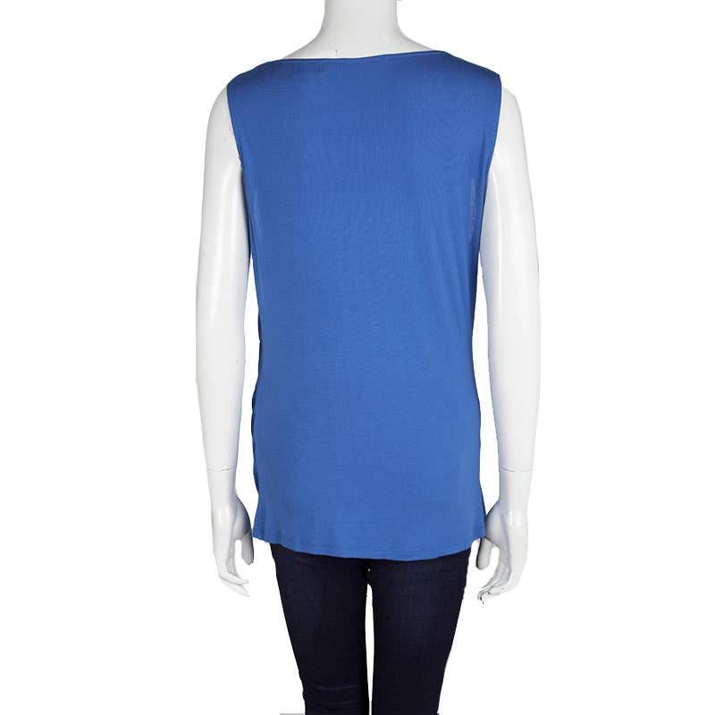 Nail your casual summer looks with this Cobalt blue perfection from Elie Tahari. Sleeveless and long design make this separate a great layering option even for the autumn/winter times. A cowl neck and a draped fit pairs well with your denim pants or