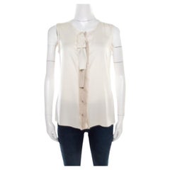 Elie Tahari Blusa sin mangas de seda crema con tapeta de contraste y detalle de volantes S