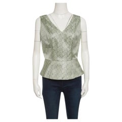 Elie Tahari péplum sans manches à carreaux multicolores S