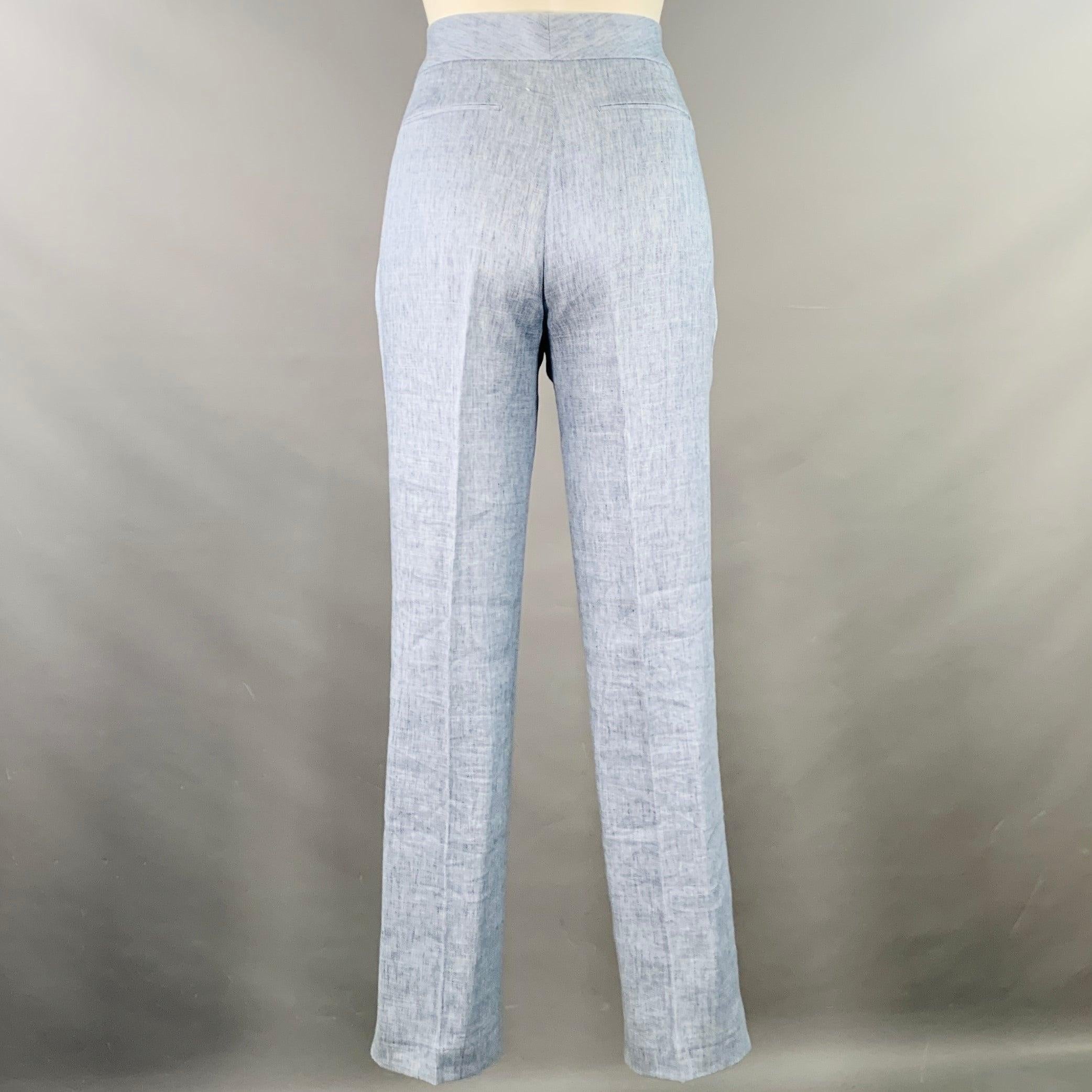 Pantalon décontracté ELIE TAHARI
en lin mélangé bleu chiné, avec un devant plat, des poches zippées invisibles, très bon état d'usage. Léger boulochage et signes d'usure. 

Marqué :   IT 40 

Mesures : 
  Taille : 29 pouces Élévation : 9 pouces