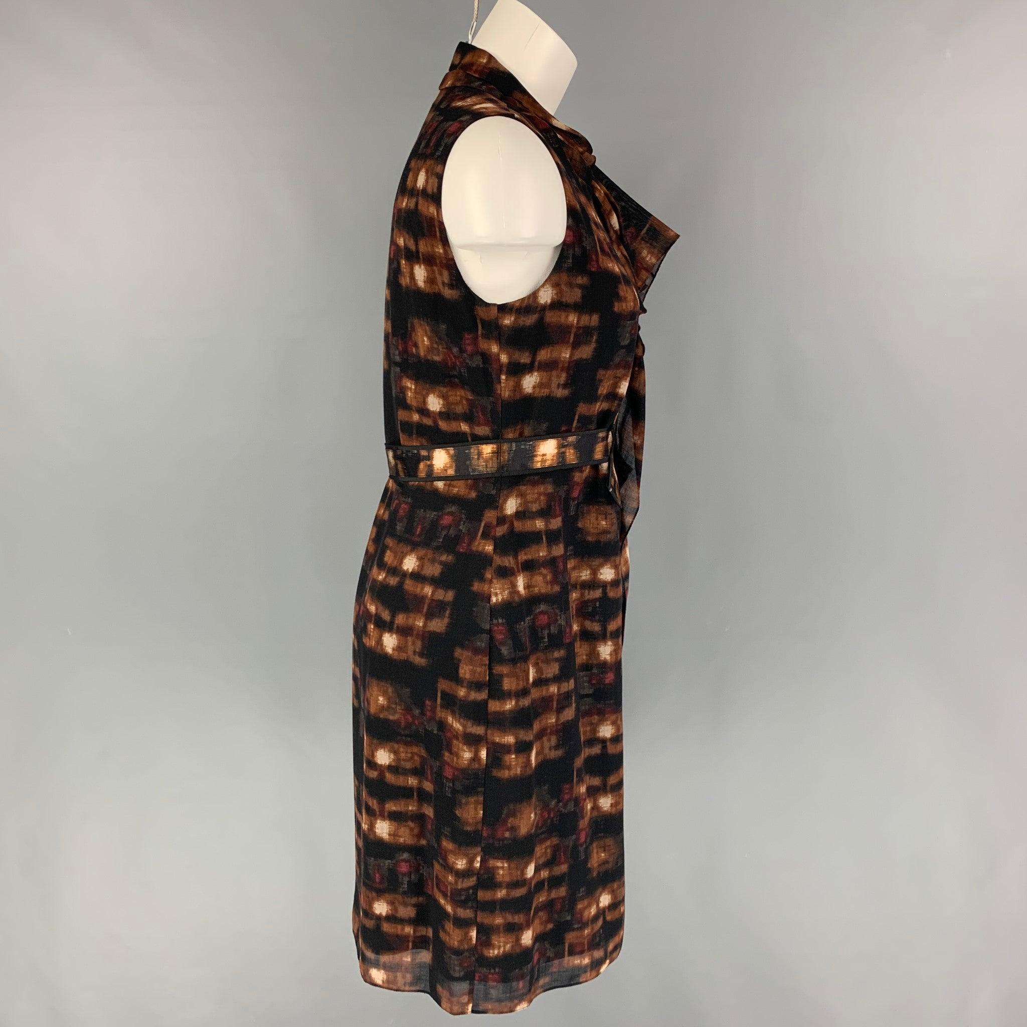 ELIE TAHARI dress comes in a brown & black marbled nylon featuring a sheath style, ruffled, belt detail, sleeveless, and a front zip up closure.
Very Good
Pre-Owned Condition. 

Marked:   6 

Measurements: 
 
Shoulder:
14 inches  Bust: 34 inches 