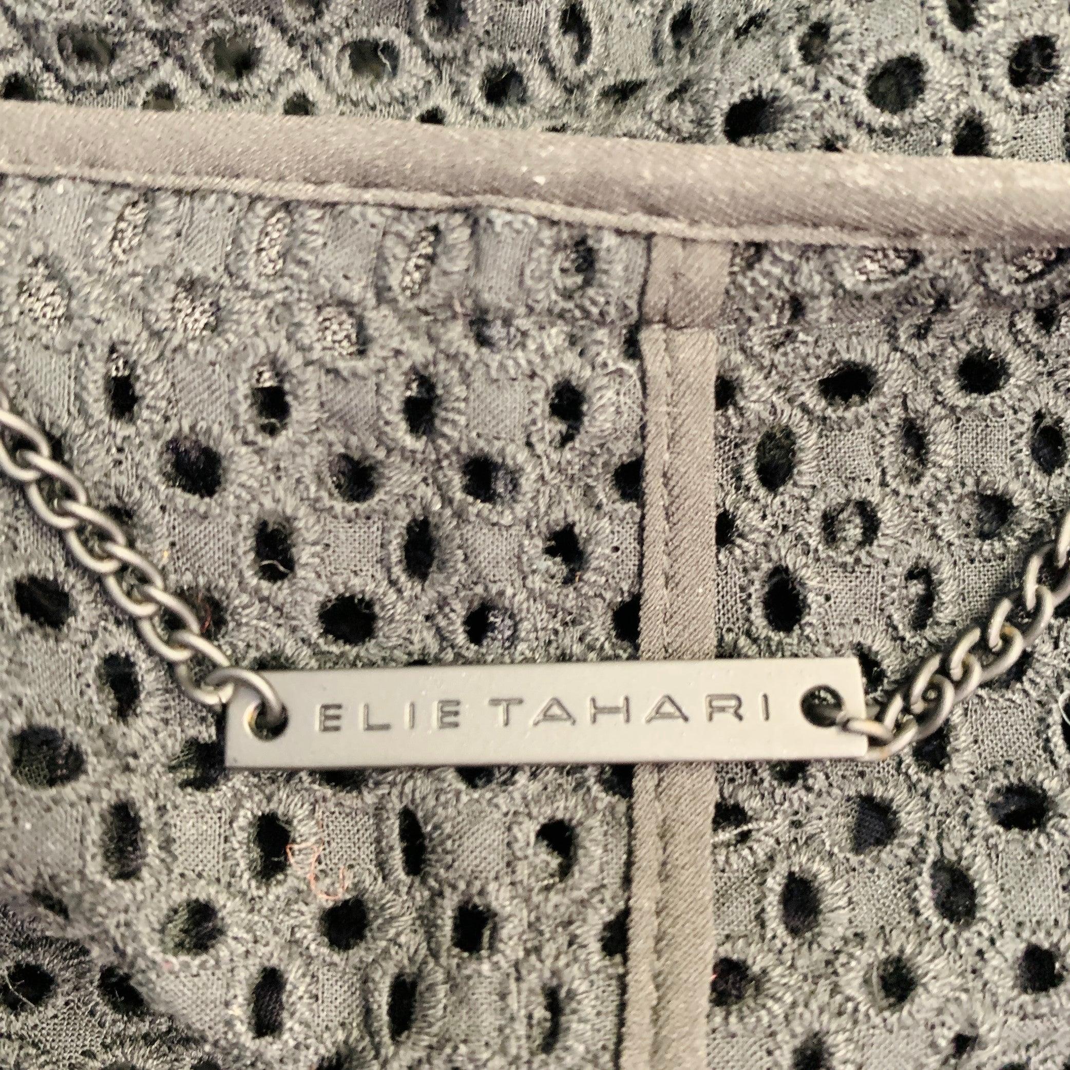 ELIE TAHARI Taille M Robe à manches longues zippées en coton noir avec œillets Excellent état - En vente à San Francisco, CA