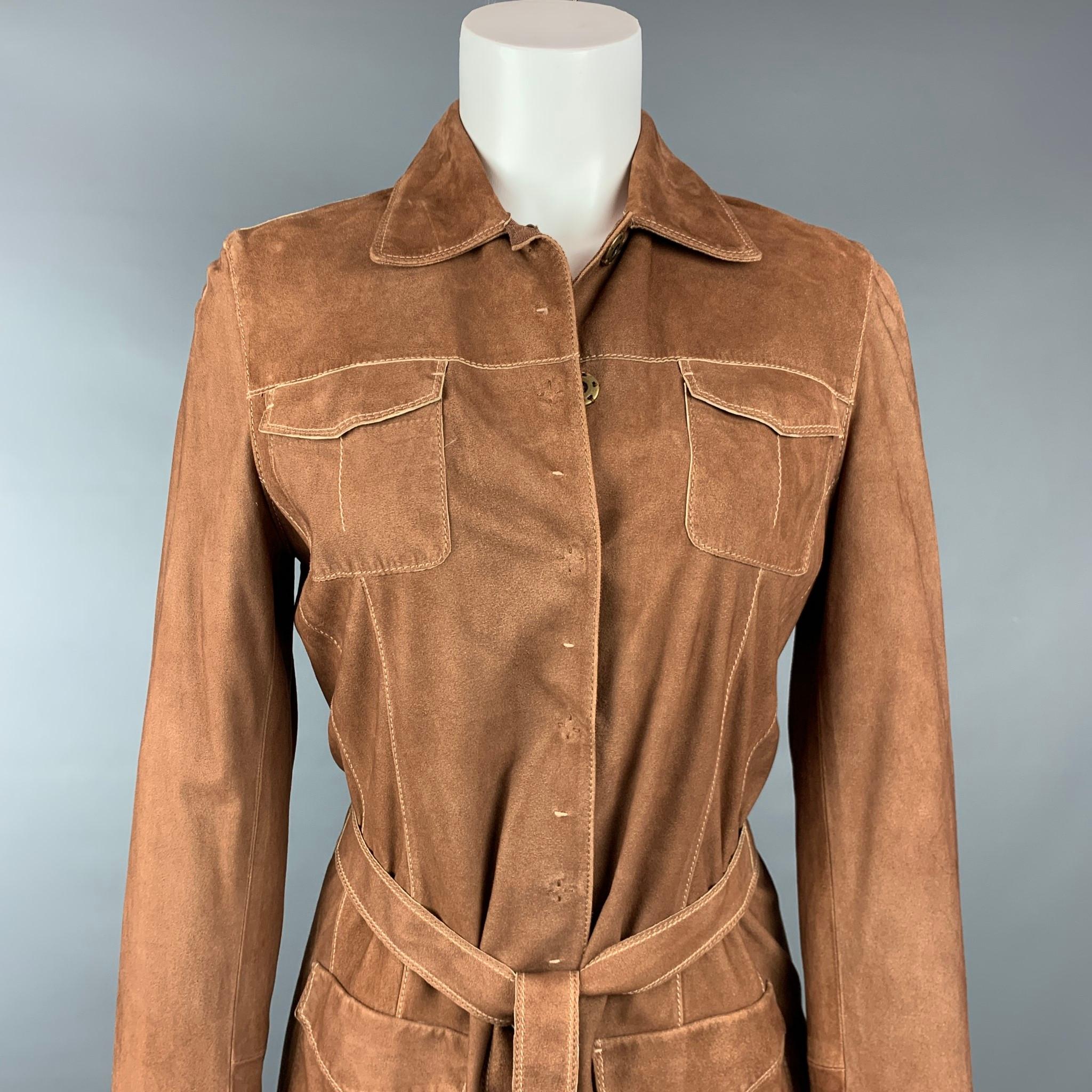 ELIE TAHARI jacket comes in a tan suede featuring a belted style, contrast stitching, front pockets, and a snap button closure. 

Very Good Pre-Owned Condition.
Marked: S

Measurements:

Shoulder: 16 in.
Bust: 36 in.
Sleeve: 25 in.
Length: 25 in. 