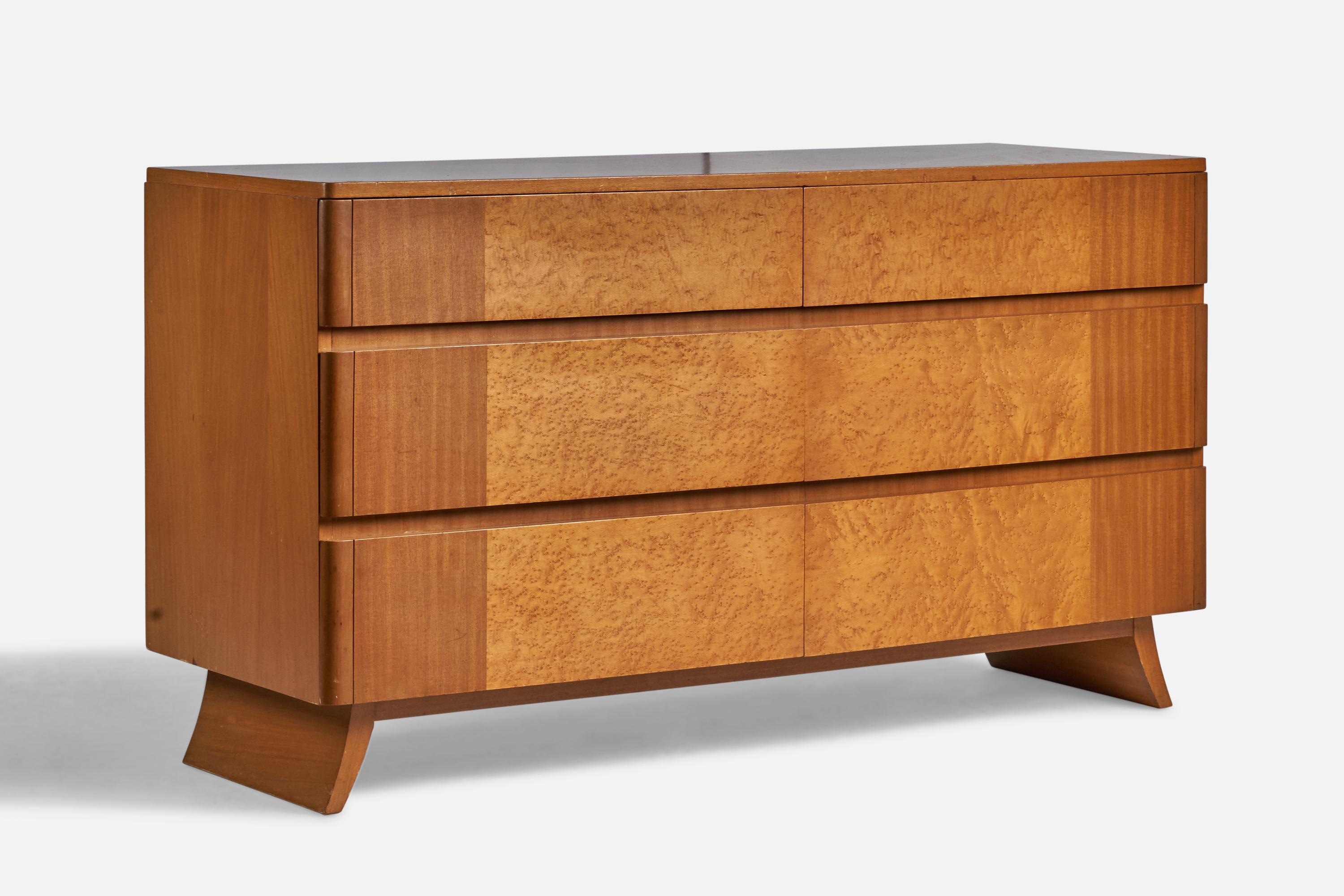 A mahogany and birch chest of drawers designed by Eliel Saarinen and produced by Rway, USA, 1940s.