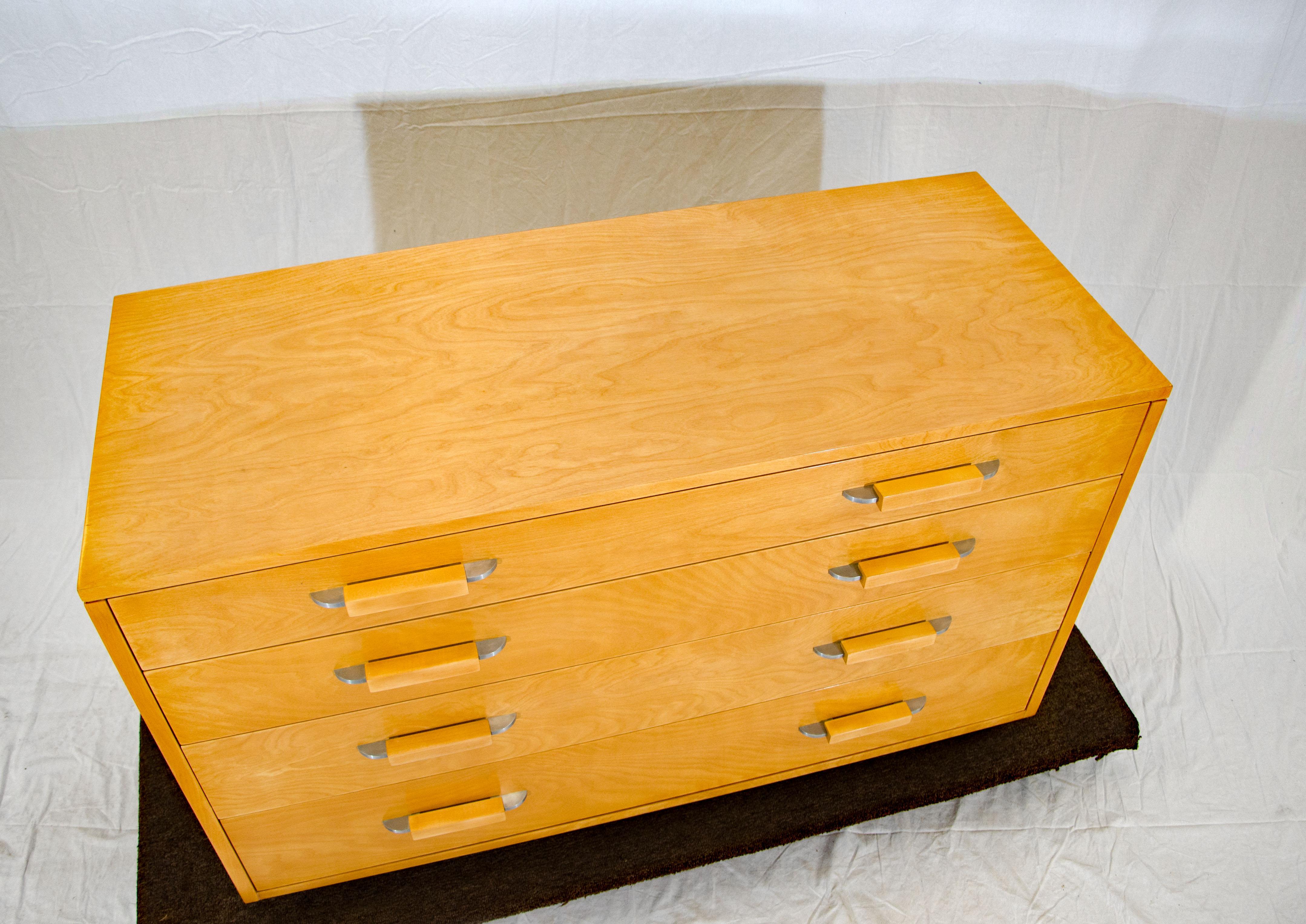 This large size chest design is from the FHA (Flexible Home Arrangement) collection by Eliel Saarinen, in collaboration with Eva-Lisa (Pipsan) Saarinen Swanson and J. Robert F. Swanson. The extended back edge of the top allows for snug placement