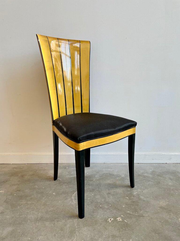 Maple and ebonized, Eliel Saarinen side chair by Adelta Finland was created after an original design by Eliel Saarinen. Stamped on the bottom with Saarinen House label. Father of Eero, Eliel an American-Finnish prolific architect in the early 20th