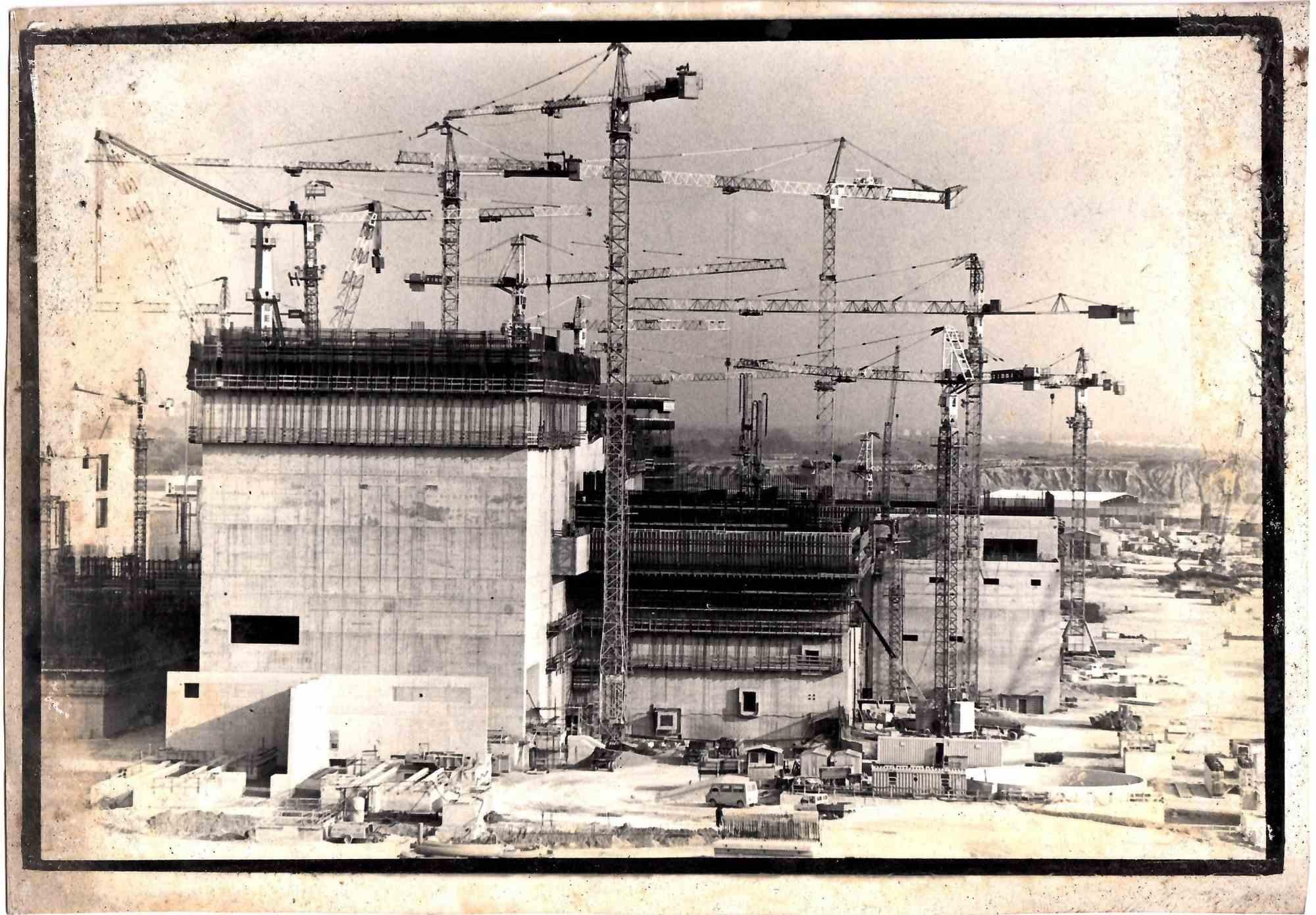 The nuclear center, vintage photograph is an original black and white photograph realized by Eligio Paoni in 1988.
Hand-signed and dated with the description on the rear.

Good conditions with foxing and sin of glue on the margins.