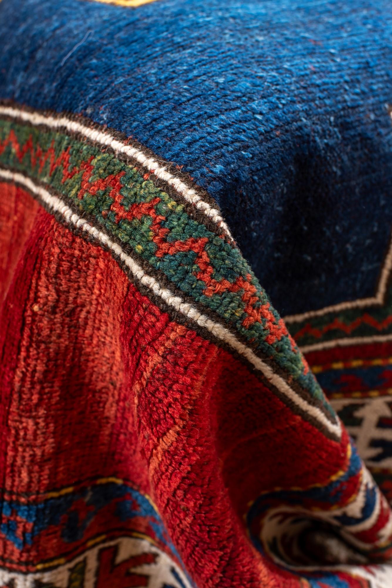 Antique Kazak Rug with Rich Blue and Red Colors In Good Condition For Sale In New York, NY
