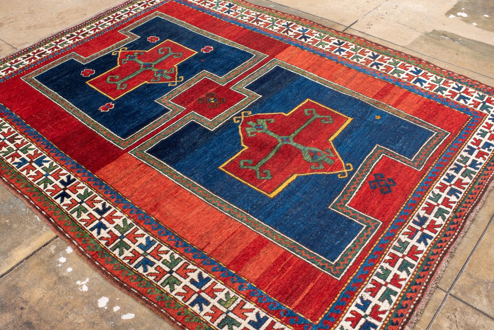 Antique Kazak Rug with Rich Blue and Red Colors For Sale 1