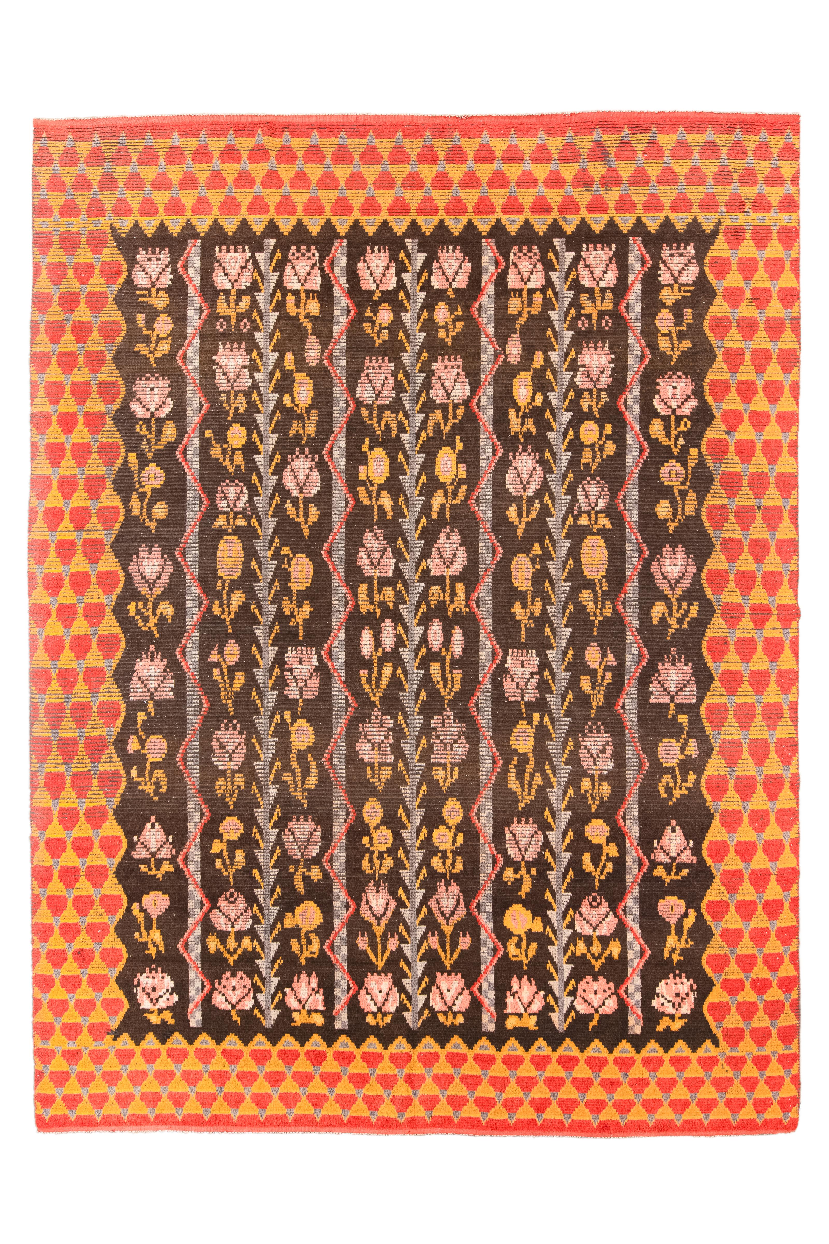 In the warm hues of Mahogany and Poppy tones, this Swedish rug from 1930 boasts a generous size of 9'6X13. Adorned with a stylish tree or flower motif, this rug exemplifies the artistry and craftsmanship of its makers. Handcrafted with meticulous