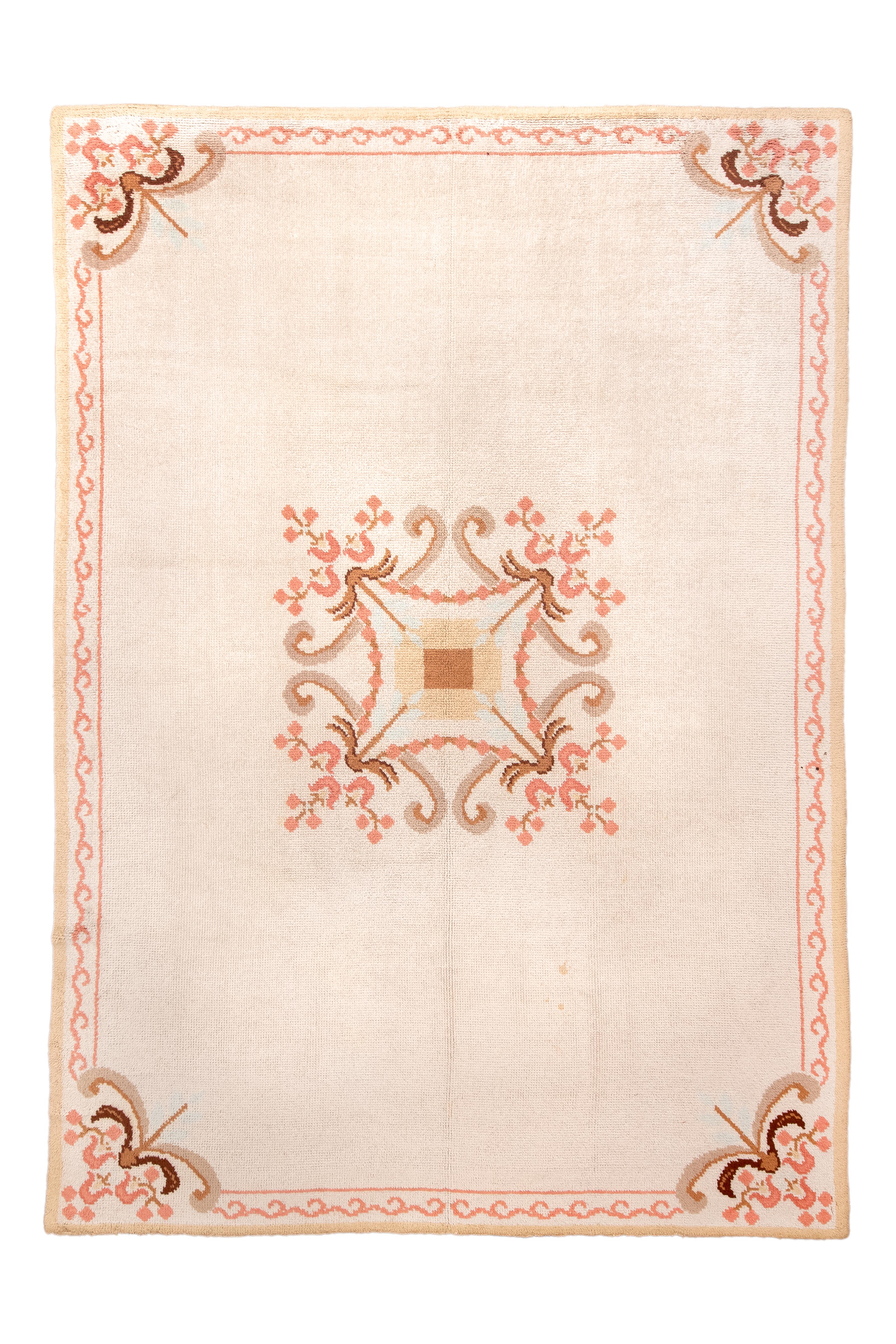 In 1910, a Swedish masterpiece emerged: an 8x11'6 rug intertwining Twine and Apricot Orange hues within an art deco design that celebrates tradition and creativity. Its rectangular shape seamlessly blends elegance with function, making it suitable