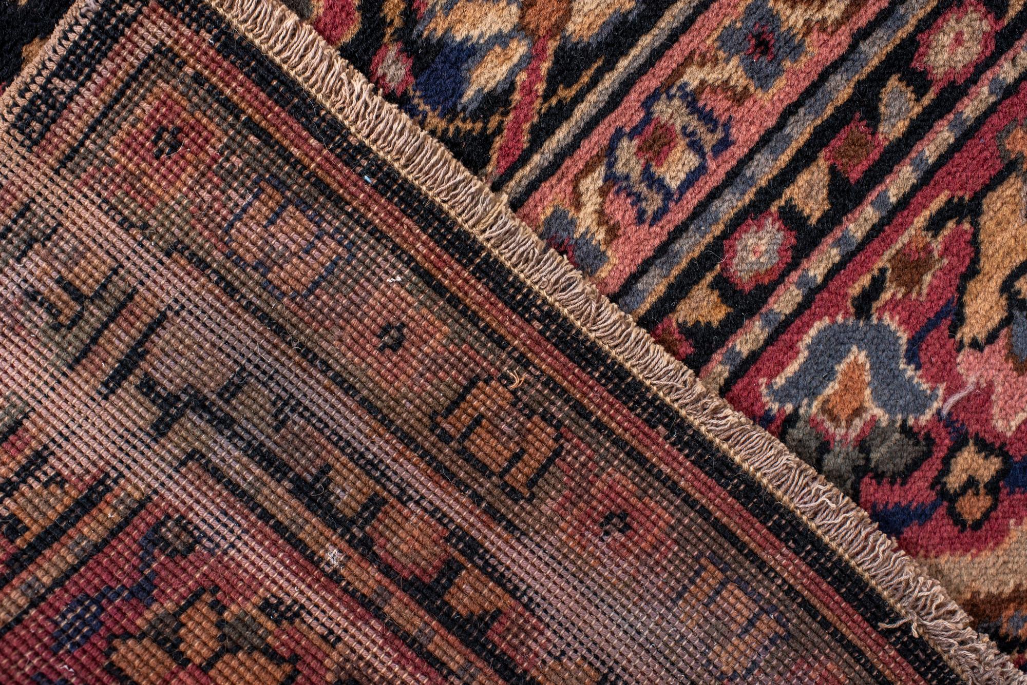 Noué à la main Tapis vintage indigo Laristan avec bordure rose tendre en vente