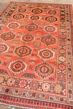 Vintage Khotan Rug with Charming Rosette Border