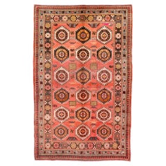 Vintage Khotan Rug with Charming Rosette Border