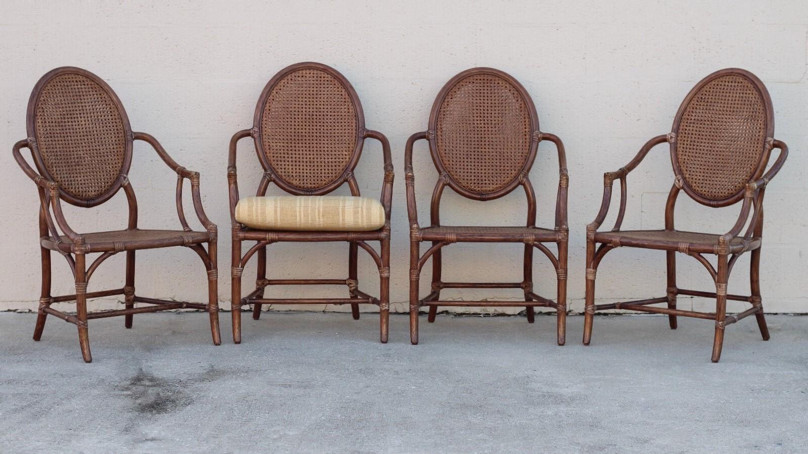 20th Century Elinor McGuire Rattan Cane Oval Back Dining Arm Chairs, a Set of Four For Sale