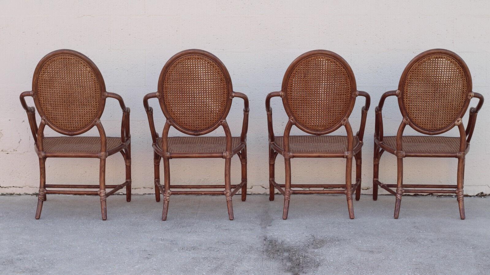 Leather Elinor McGuire Rattan Cane Oval Back Dining Arm Chairs, a Set of Four For Sale