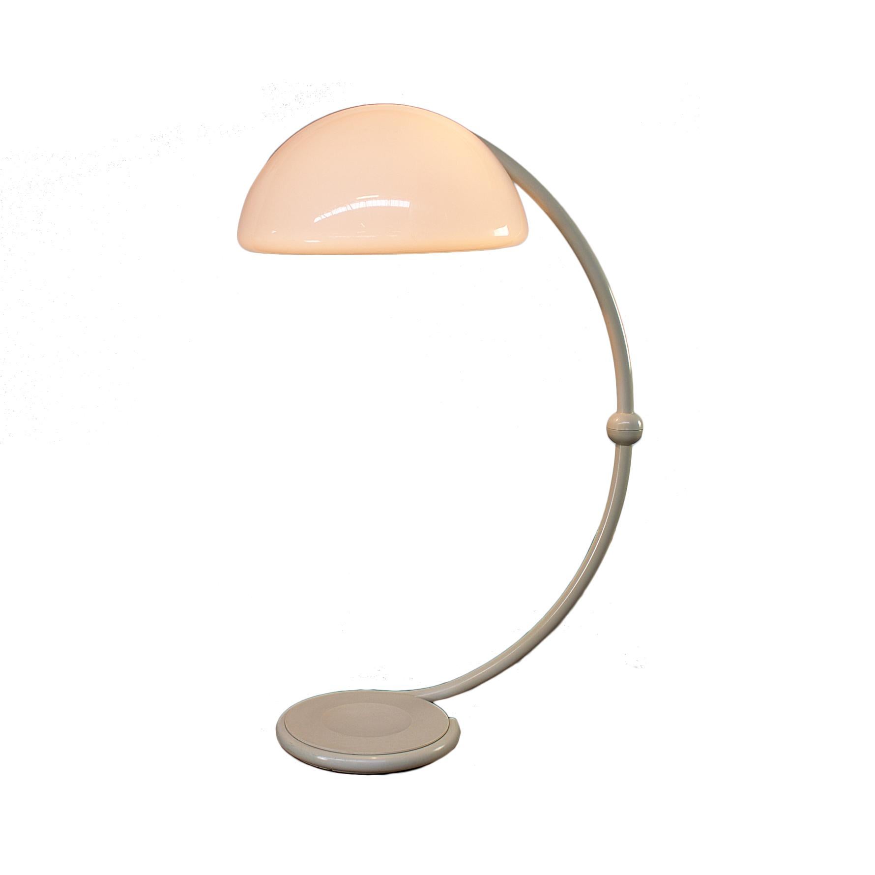 Floor lamp, diffused light, swing arm, white opal methacrylate diffuser, metal frame in white color. This floorlamp can rotate 360 degrees.

Signed by Martinelli Luce on bottom.

Designed in 1965 by Elio Martinelli, the lamp is made of