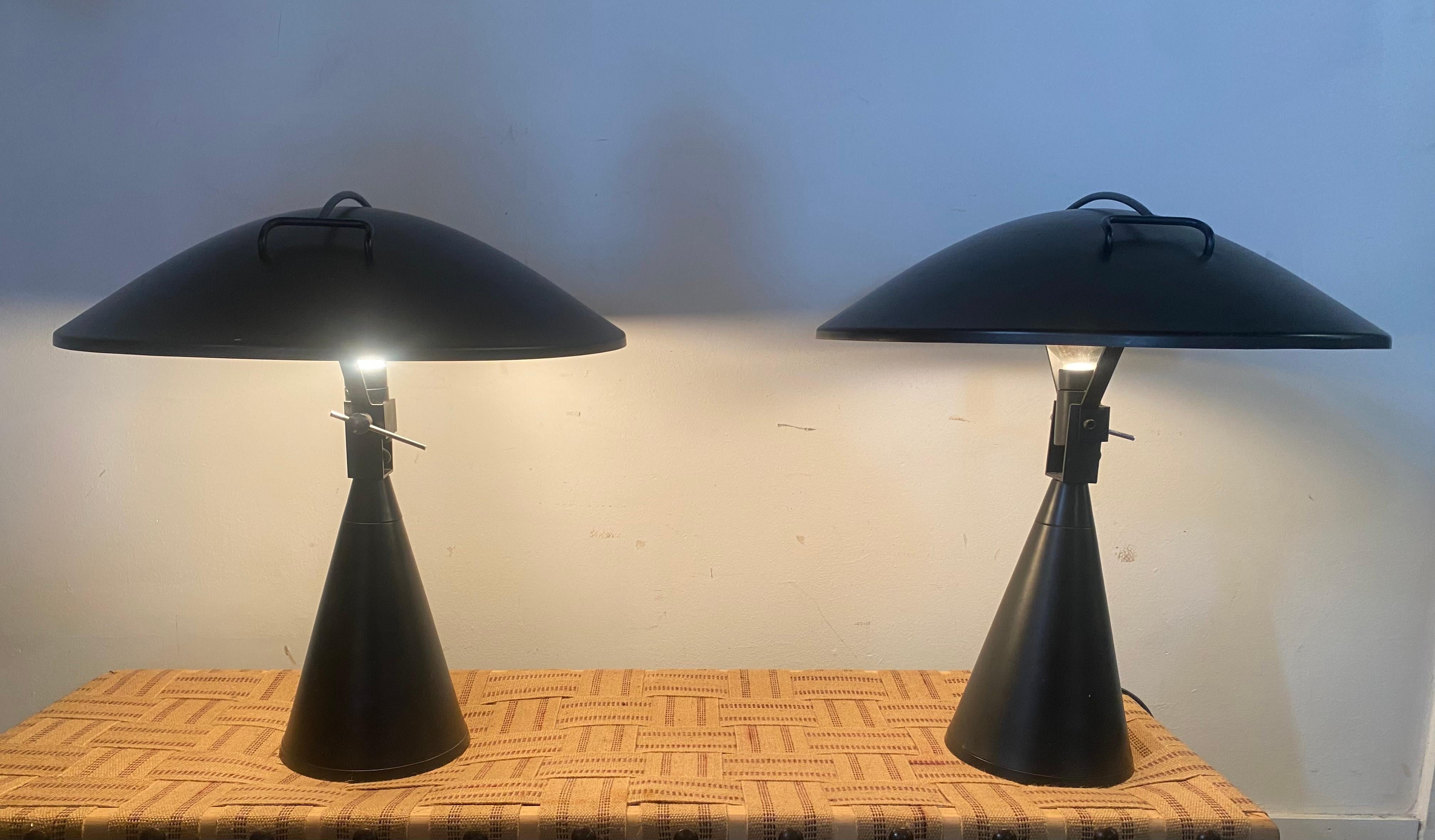 
Table lamp model 676 'Radar', by Elio Martinelli for Martinelli Luce, Italy, 1976. Pair avail.. selling individually.. Both in nice original condition..Minor bumps and bruises..  One missing original on / off switch cover (see photo)

Exceptional
