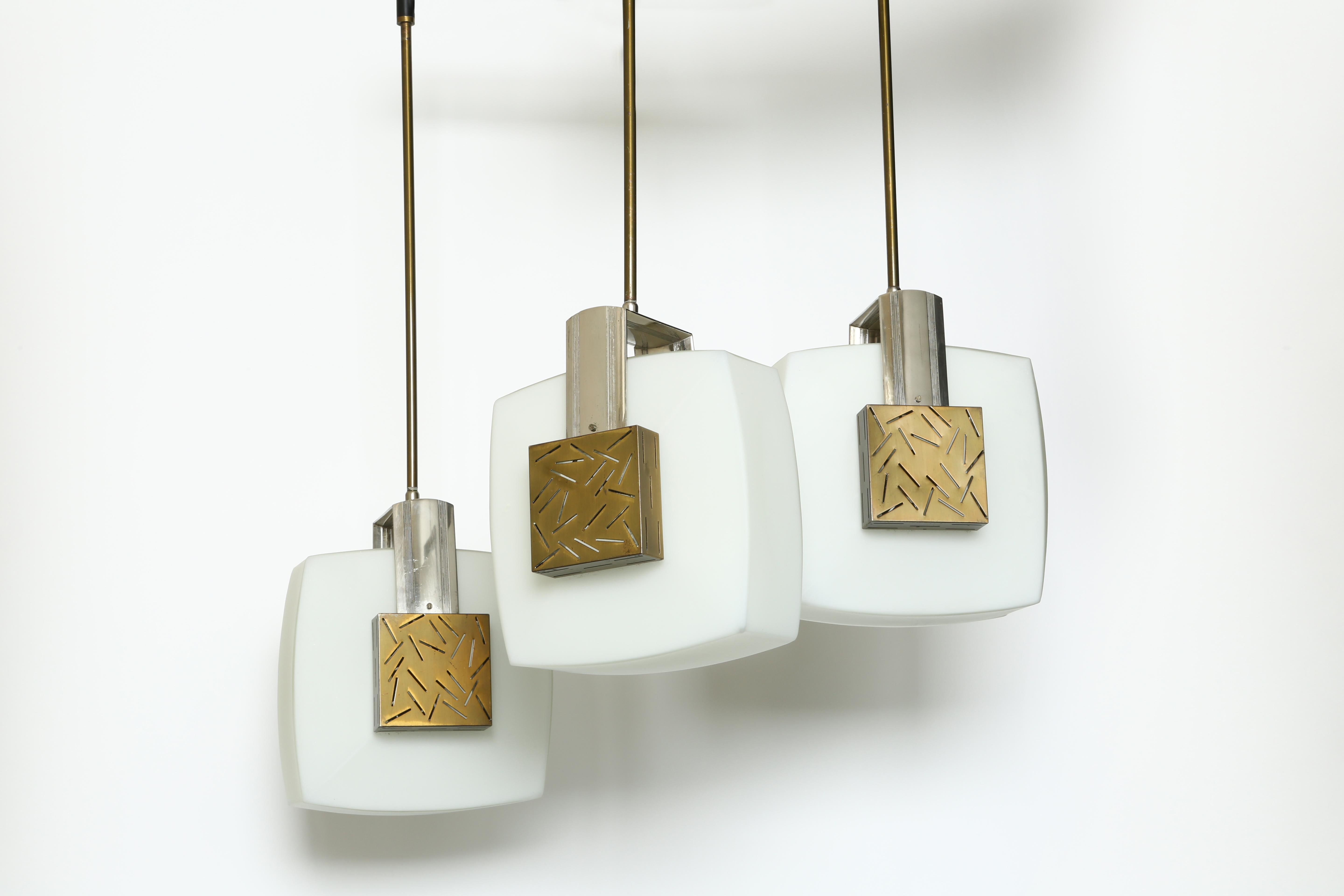 Elio Monesi for Arredoluce chandelier.
Very rare ceiling light. Model 12815.
Duplex white opal glass, patinated brass, nickel-plated metal.
Matching ceiling pendant also available. 
Literature: Arredoluce. Catalogue Raisonne, Page 331
 