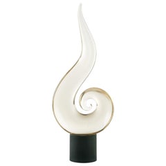 Scultura in vetro di Elio Raffaeli su base di vetro a forma di Nautilus, Murano
