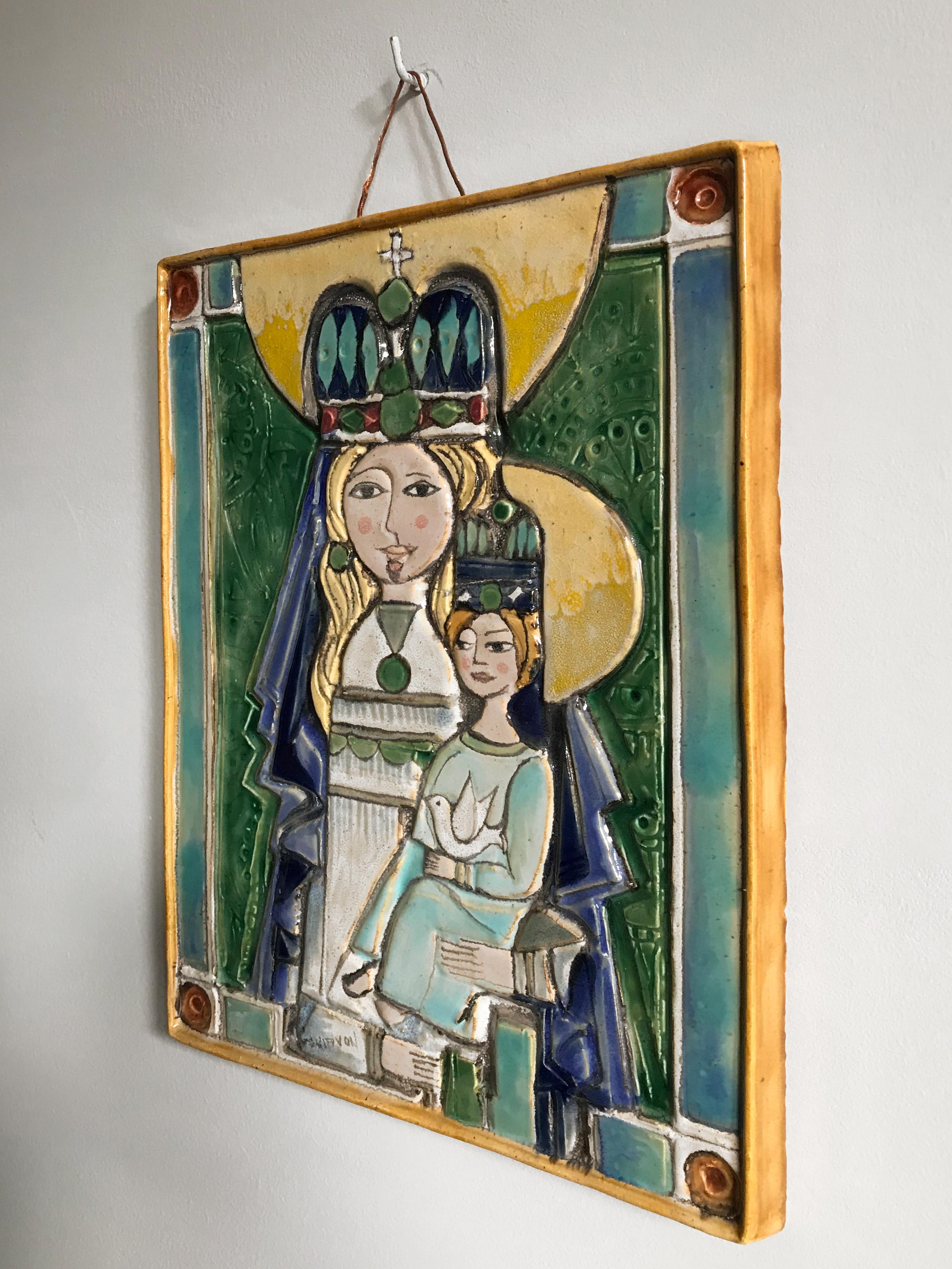 Italian polychrome glazed ceramic panel decorated in bas-relief depicting Madonna and Child, by Elio Schiavon, signed at the base, Padova, 1950s.

Please note that the item is original of the period and this shows normal signs of age and use.