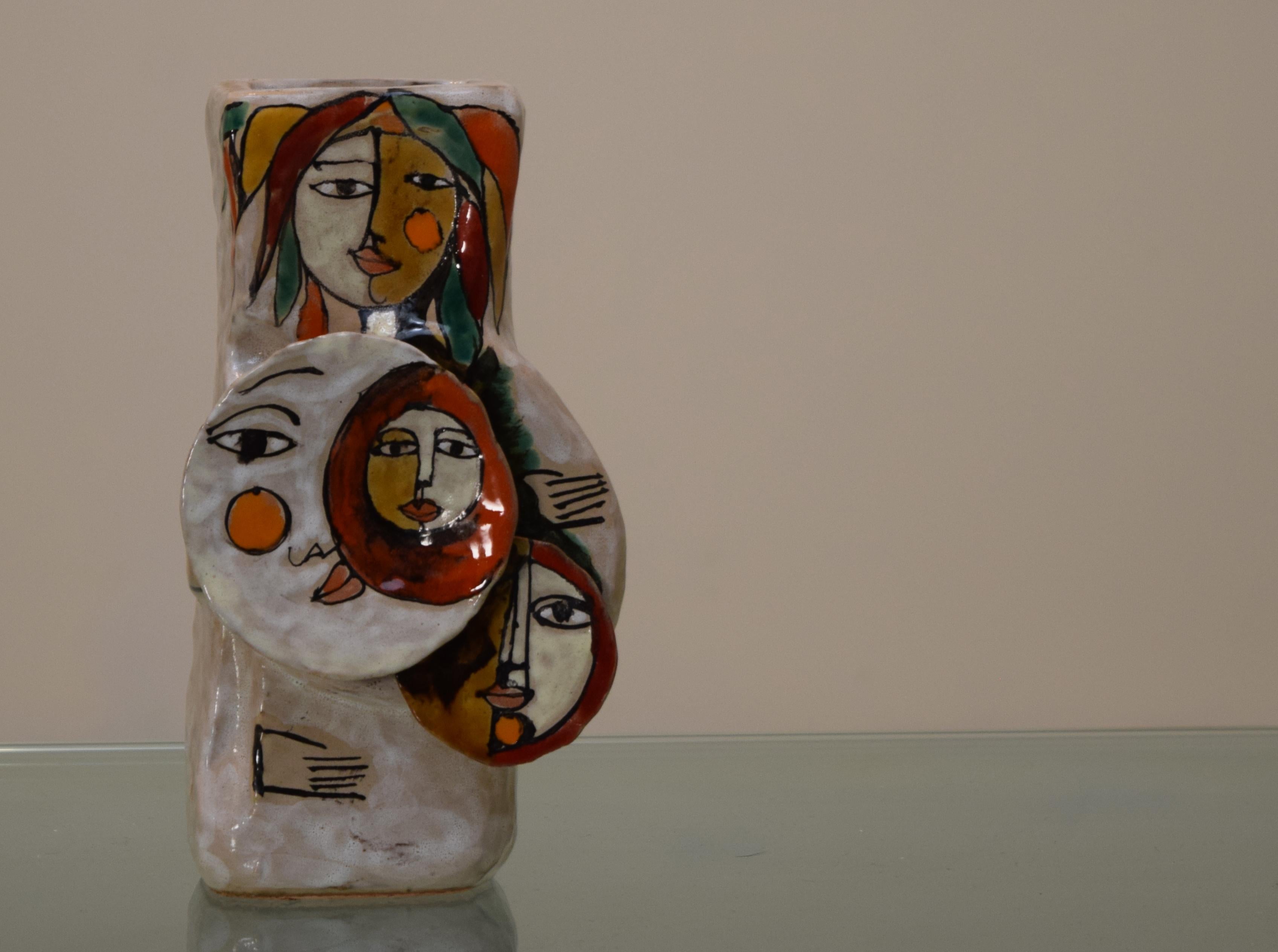 Italy. A beautiful studio hand built constructivist hi-glaze figurative sculptural ceramic vase by Elio Schiavon, circa 1960s. One of his most unique pieces depicting women in several layers of relief and not unlike similar styles expressed by Roger