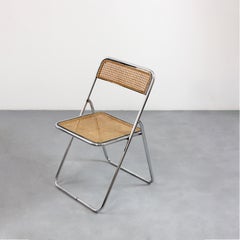 Silla "Elios" con estructura de acero cromado y asiento y respaldo de caña natural - Italia