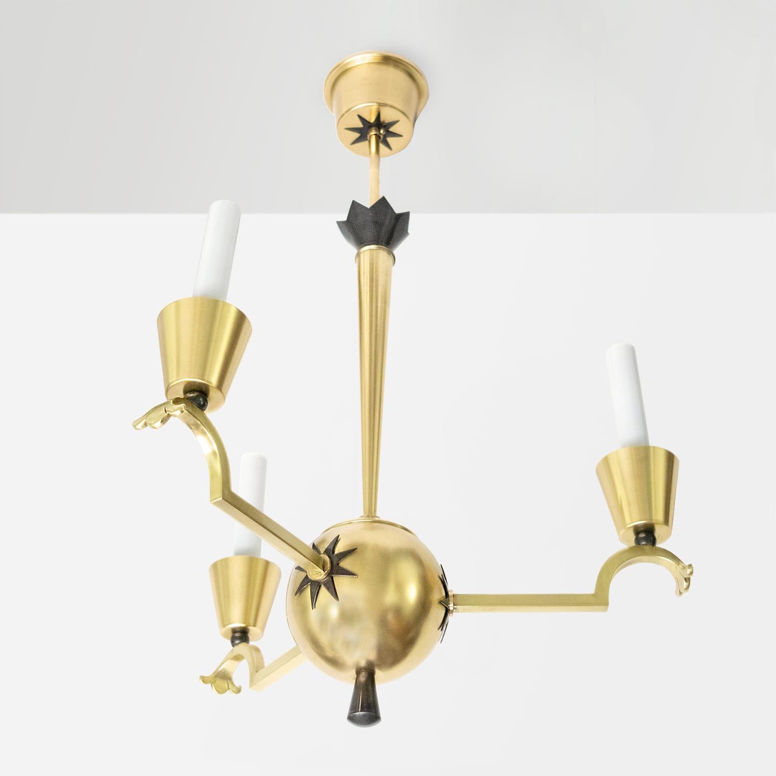 Elegant Swedish Grace three-arm chandelier in polished and patinated brass design by Elis Bergh for C.G, Hallberg, Stockholm, Sweden late 1920s-early 1930s. Newly polished and lacquered and re-wired with 3 candelabra sockets for use in the USA.